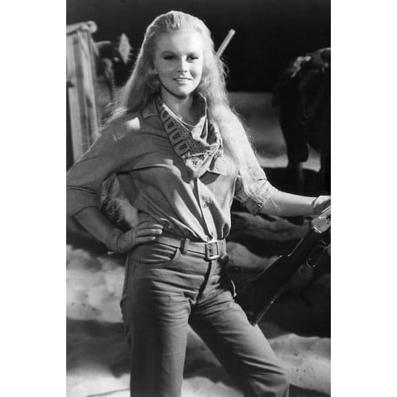 Ann-Margret in the Train Robbers 24x36 Poster Posing With Rifle Smiling Hands on Hip