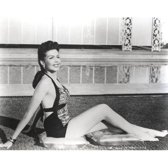 Ann Miller sunbathing poolside Photo Print (24 x 30)