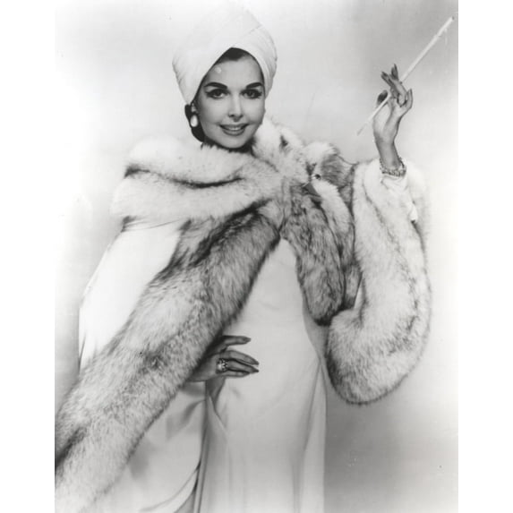 Ann Miller wearing a fur wrap while smoking Photo Print (24 x 30)