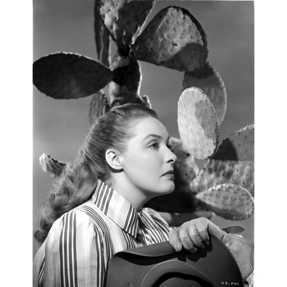 Ann Richards Looking Away Under a Cactus in Classic Photo Print (24 x 30)