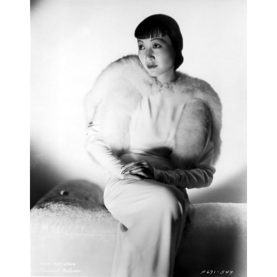 Anna Wong sitting on the Couch with a Furry Blazer Photo Print (24 x 30)