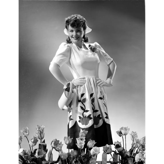 Anne Baxter on a Printed Dress with Hands on Waist Photo Print (24 x 30)