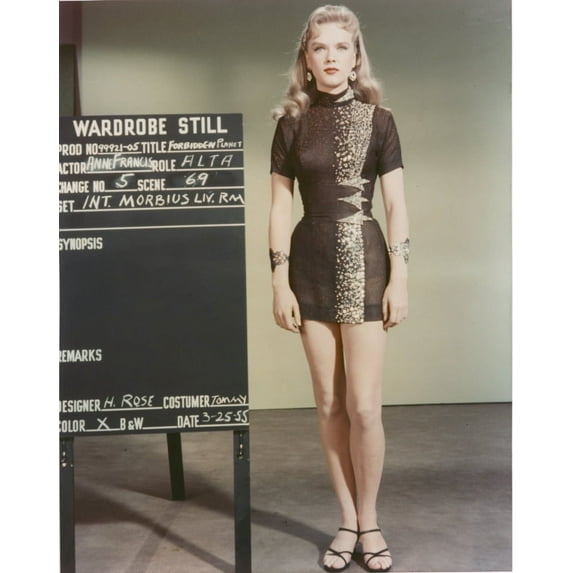 Anne Francis standing in Sexy Black Dress Photo Print (8 x 10)