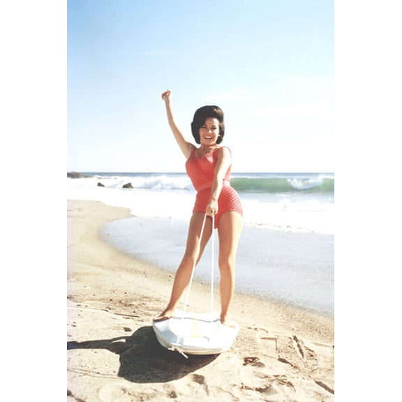 Annette Funicello in Beach Blanket Bingo on surf board on beach 24x36 Poster