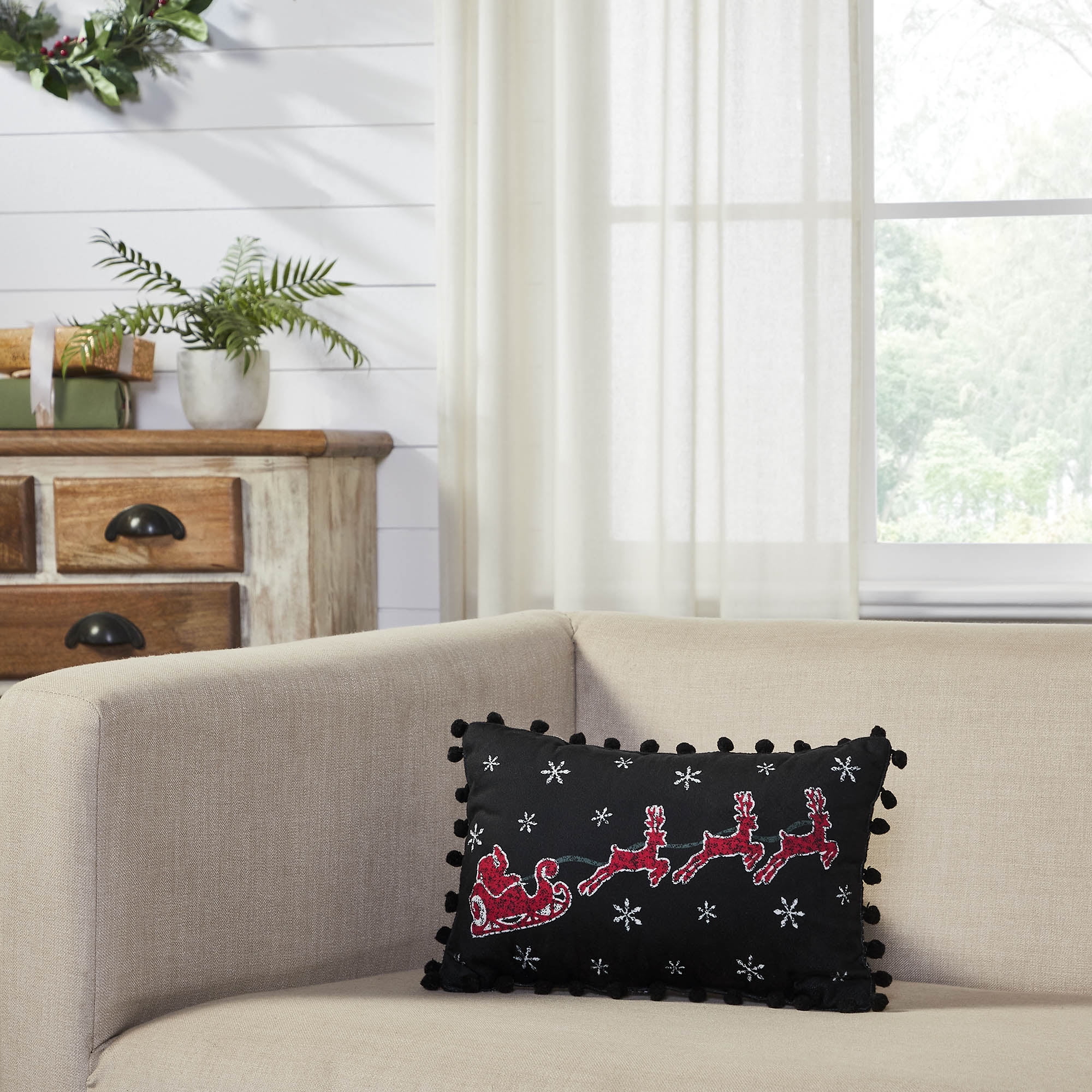 Black and Red Santa Sleigh Pom Pom Throw Pillow