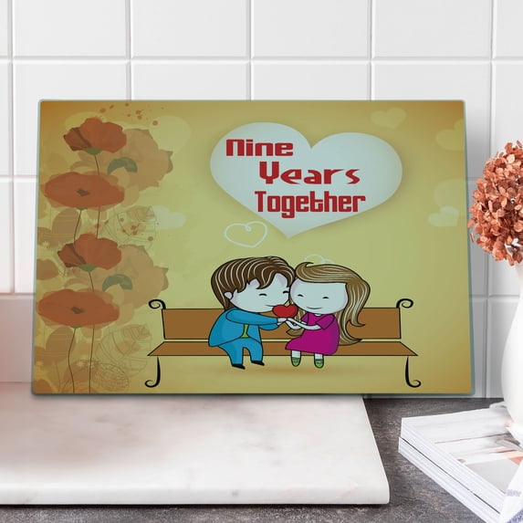Anniversary Cutting Board, 9 Years Together Cartoon Couple Sits on a Bench with Floral Ornaments, Decorative Tempered Glass Cutting and Serving Board, in 3 Sizes, by Ambesonne