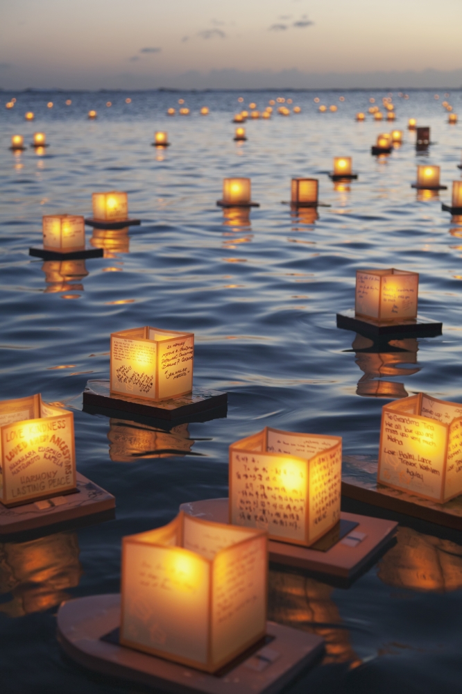 Annual lantern floating ceremony during sunset at Ala Moana Oahu Hawaii United States of America Canvas Art - Brandon Tabiolo Design Pics (12 x 19)
