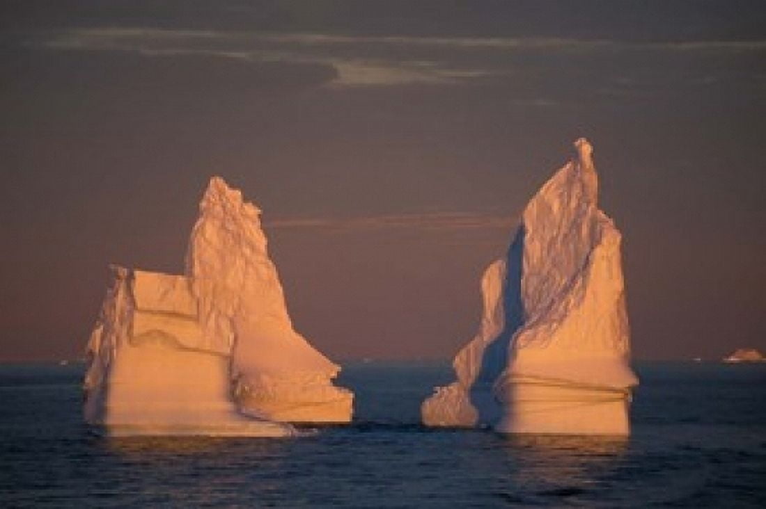 Antarctic Peninsula icebergs at midnight sunset Canvas Art - Kevin Schafer DanitaDelimont (24 x 15)