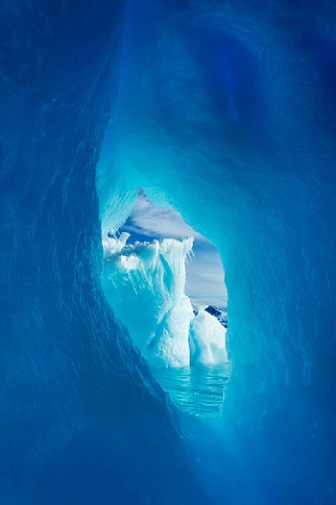 Antarctica Iceberg framed in arch of another in Wilhelmina Bay Canvas Art - Paul Souders DanitaDelimont (26 x 39)