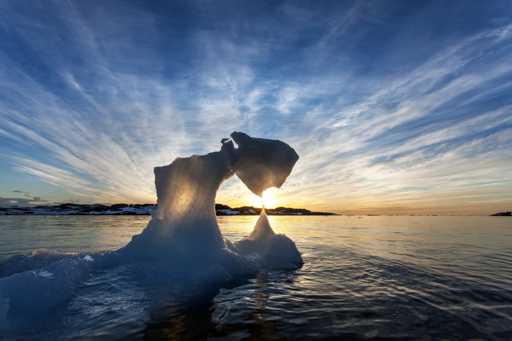 Antarctica Setting midnight sun lights Iceberg near Palmer Station by Torgersen Island on spring evening Canvas Art - Paul Souders Design Pics (36 x 24)