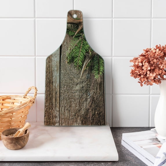 Antlers Cutting Board, Evergreen Branch Deer Antler Against Rustic Wooden Background Print, Decorative Tempered Glass Cutting and Serving Board, Wine Bottle Shape, Fern Green Umber, by Ambesonne