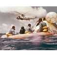 thumbnail image 1 of Apollo 12 Pacific Recovery. Astronauts Are In A Life Raft Near The Command Module With A Helicopter Hovering Above. Nov., 1 of 2