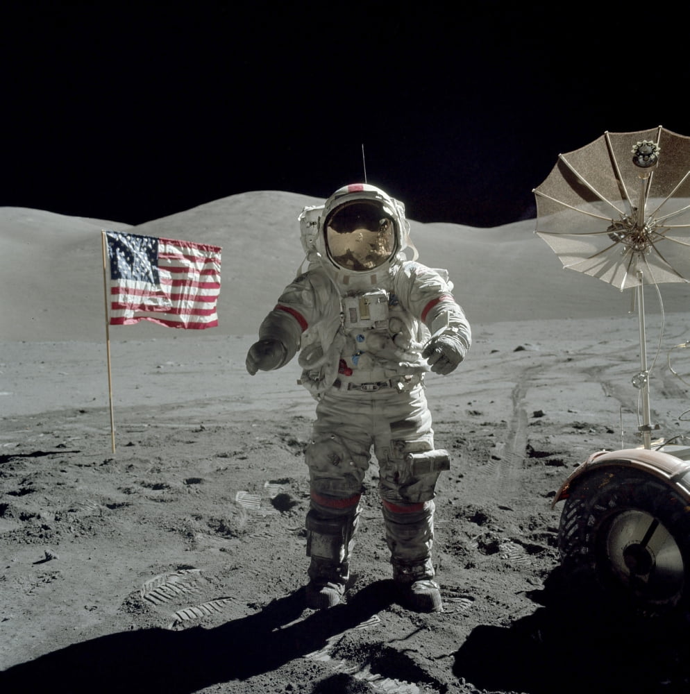 Apollo 17 astronaut stands near the American flag on the lunar surface Canvas Art - Stocktrek Images (29 x 29)
