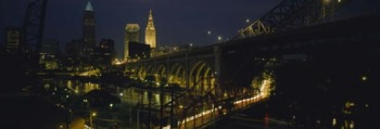 Arch bridge and buildings lit up at night Cleveland Ohio USA Canvas Art - Panoramic Images (36 x 13)