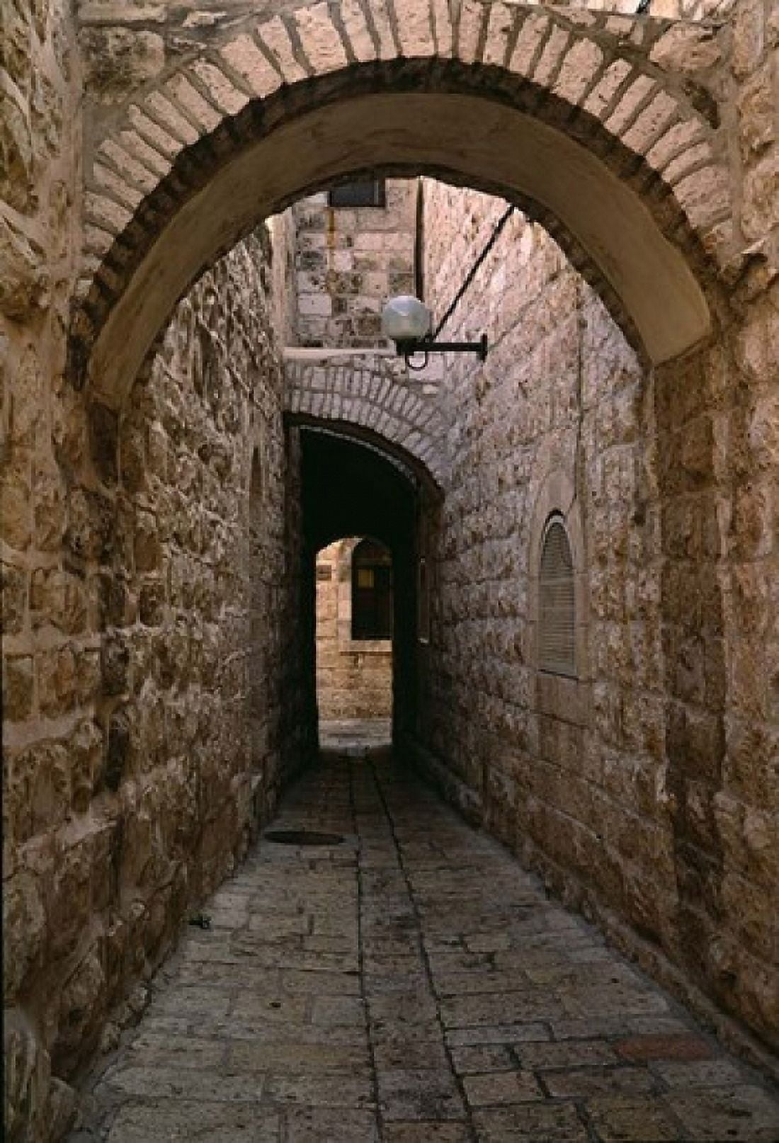 Arch of Jerusalem Stone and Narrow Lane Israel Canvas Art - Jerry Ginsberg DanitaDelimont (18 x 26)