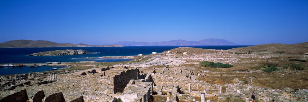 Archaeological site on an island Delos Cyclades Islands Greece Canvas Art - Panoramic Images (12 x 36)