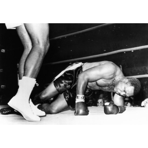 Archie Moore On The Canvas In The Fourth Round Of His Fight With 20 Year Old Cassius Clay. Nov. 15 History