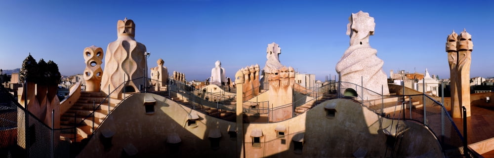 Architectural details of rooftop chimneys La Pedrera Barcelona Catalonia Spain Canvas Art - Panoramic Images (27 x 9)