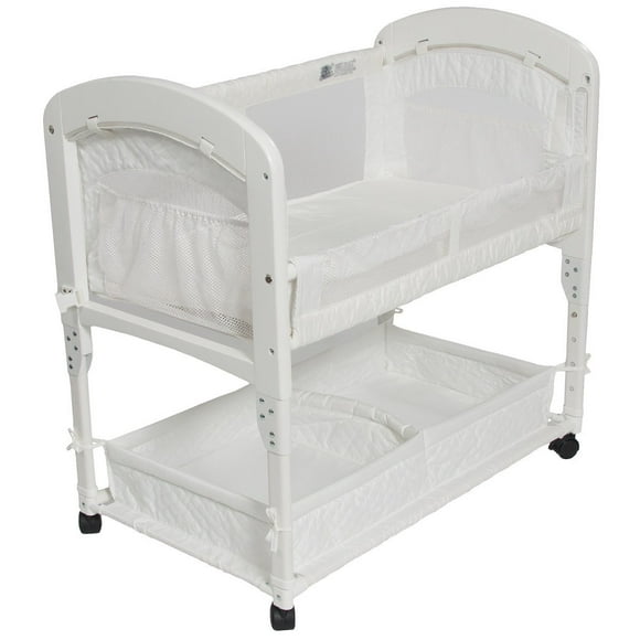 Arm s Reach Cambria Co-Sleeper Bedside Bassinet Featuring Height-Adjustable Legs, Curved Wooden Ends, Breathable Mesh Sides with Pockets, and Large Lower Storage Basket, White
