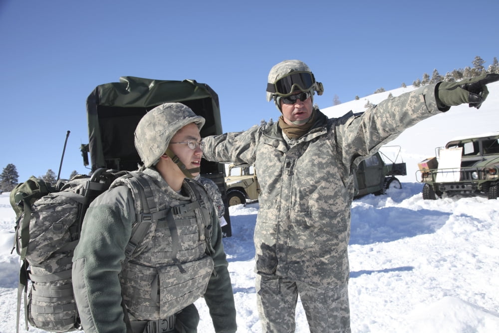 Army Specialist receives guidance as he begins a land navigation event Canvas Art - Stocktrek Images (34 x 23)