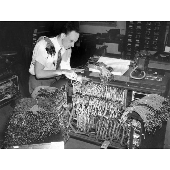 Art.com A Engineer Works on a IBM Computer Used to Administer Gl Insurance Dividend for Millions of Vets Photo, 16" x 12"