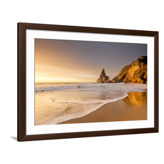 Art.com Golden Reflections of the Cliffs on Praia Da Ursa Beach Bathed by Ocean at Sunset, Cabo Da Roca Photographic Print by Roberto Moiola, Brown Frame Wall Art, 44" x 32"