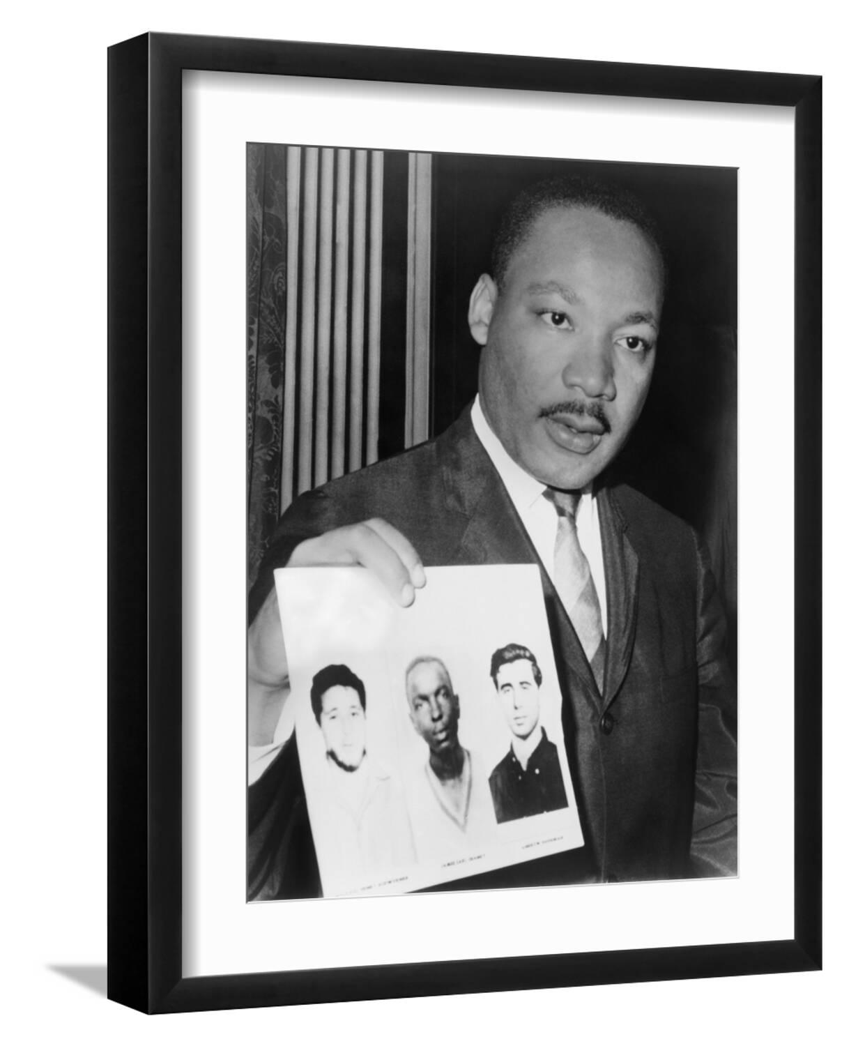 Martin Luther King Holding Photographs of Three Murdered Civil