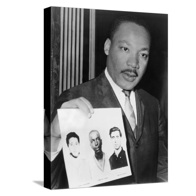 Martin Luther King Holding Photographs of Three Murdered Civil