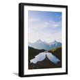 thumbnail image 1 of Art.com Mountain biker looking at Bachalpsee lake and Bernese Oberland mountains at dawn Photographic Print by Roberto Moiola, Black Frame Wall Art, 17" x 23", 1 of 5