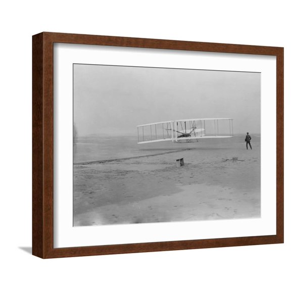 Art.com Orville Wright on First Flight at 120 feet Photograph - Kitty Hawk, NC Art Print by Lantern Press, Brown Frame Wall Art, 21" x 17"