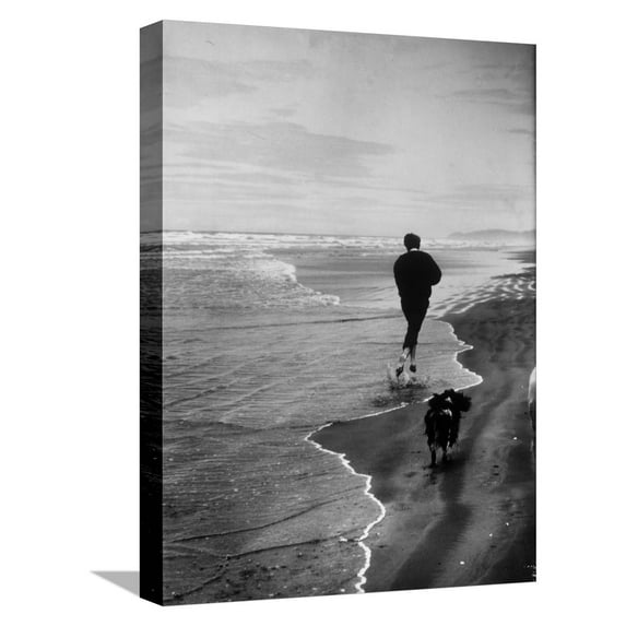Art.com Robert F. Kennedy Running on the Beach with His Dog Freckles Stretched Canvas Print Wall Art by Bill Eppridge, 12" x 16"