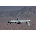 The Predator Drone Carrying Hellfire Missiles in Flight, Dec