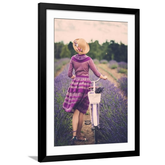 Art.com Woman in Purple Dress and Hat with Retro Bicycle in Lavender Field Art Print by NejroN Photo, Black Frame Wall Art, 32" x 44"