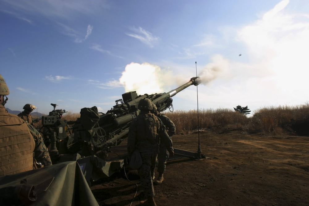 Artillerymen fire a 155mm round out of an M777 lightweight howitzer Canvas Art - Stocktrek Images (35 x 23)