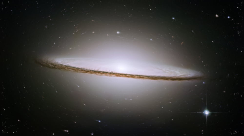 Artists painting of the Sombrero Galaxy Canvas Art - Carlyn IversonStocktrek Images (38 x 21)