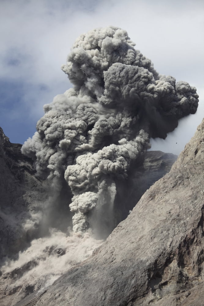 Ash cloud rises from crater of Batu Tara volcano Indonesia Canvas Art - Richard RoscoeStocktrek Images (12 x 18)