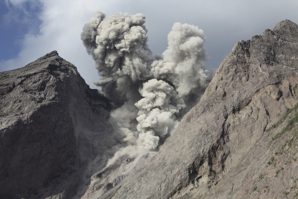 Ash cloud rises from crater of Batu Tara volcano Indonesia Canvas Art - Richard RoscoeStocktrek Images (18 x 12)