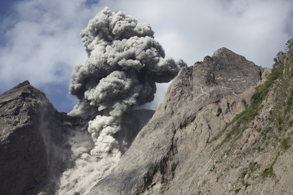 Ash cloud rises from crater of Batu Tara volcano Indonesia Canvas Art - Richard RoscoeStocktrek Images (35 x 23)