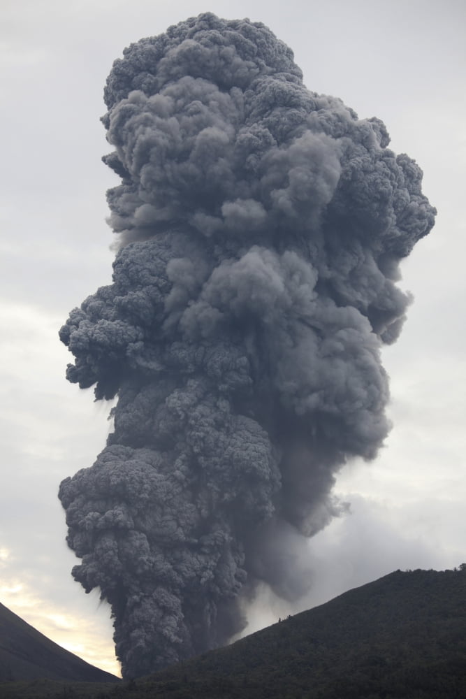 Ash cloud rising from Tompaluan crater at Lokon-Empung volcano Indonesia Canvas Art - Richard RoscoeStocktrek Images (12 x 18)