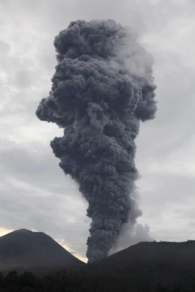 Ash cloud rising from Tompaluan crater at Lokon-Empung volcano Indonesia Canvas Art - Richard RoscoeStocktrek Images (12 x 18)
