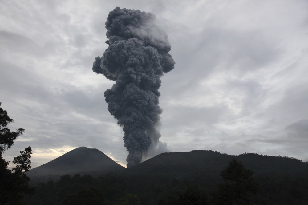 Ash cloud rising from Tompaluan crater at Lokon-Empung volcano Indonesia Canvas Art - Richard RoscoeStocktrek Images (18 x 12)