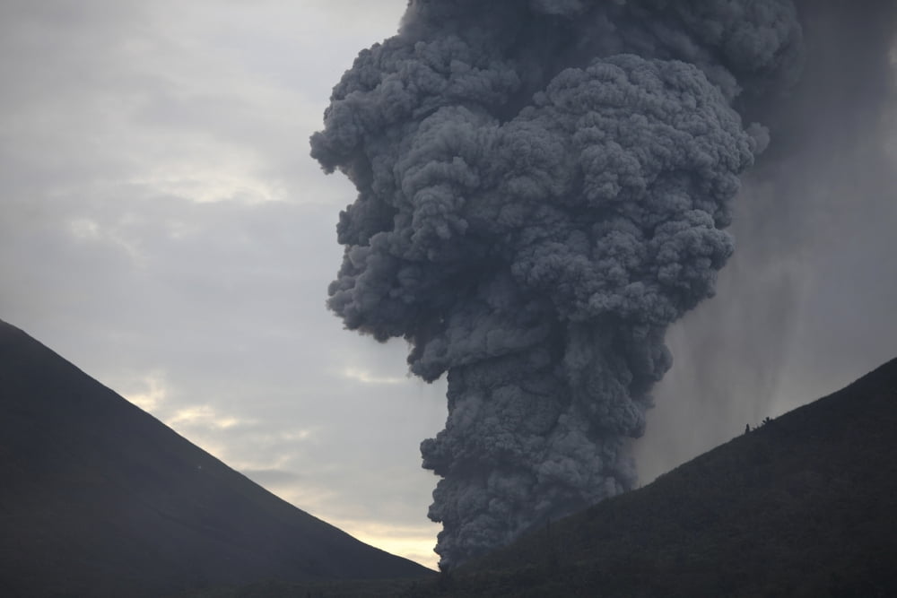 Ash cloud rising from Tompaluan crater at Lokon-Empung volcano Indonesia Canvas Art - Richard RoscoeStocktrek Images (18 x 12)