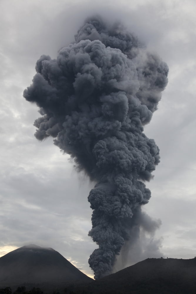 Ash cloud rising from Tompaluan crater at Lokon-Empung volcano Indonesia Canvas Art - Richard RoscoeStocktrek Images (23 x 35)