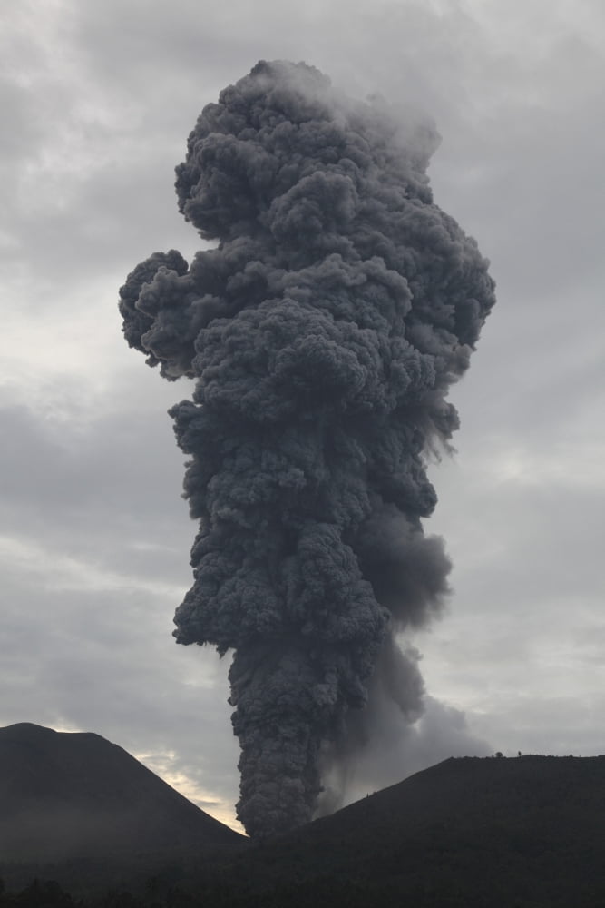 Ash cloud rising from Tompaluan crater at Lokon-Empung volcano Indonesia Canvas Art - Richard RoscoeStocktrek Images (23 x 35)