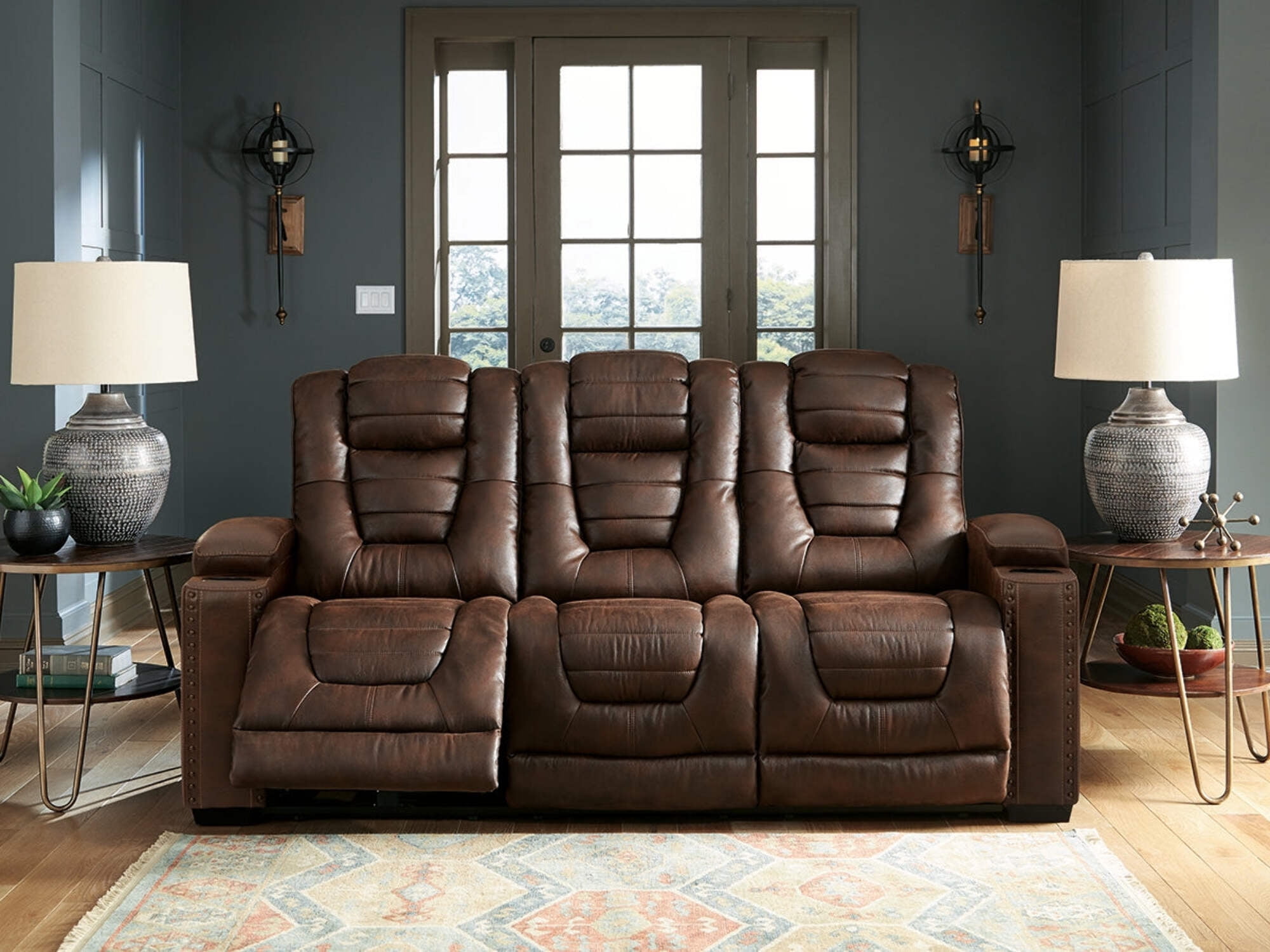 Brown Tufted Faux Leather Reclining Sofa with Storage and Cup Holder