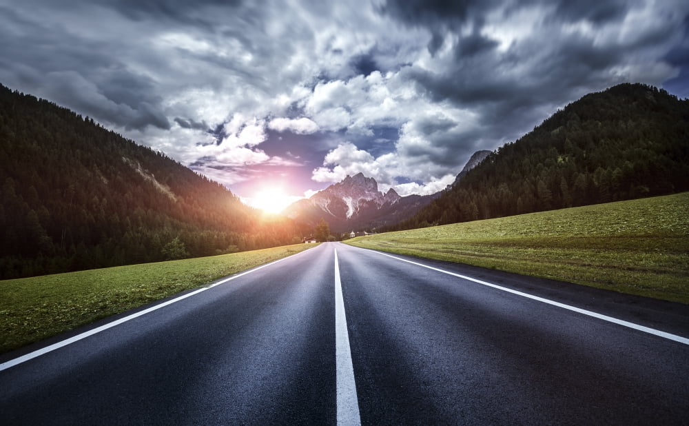 Asphalt road in the Dolomite Alps against moody clouds Northern Italy Canvas Art - Evgeny KuklevStocktrek Images (18 x 11)