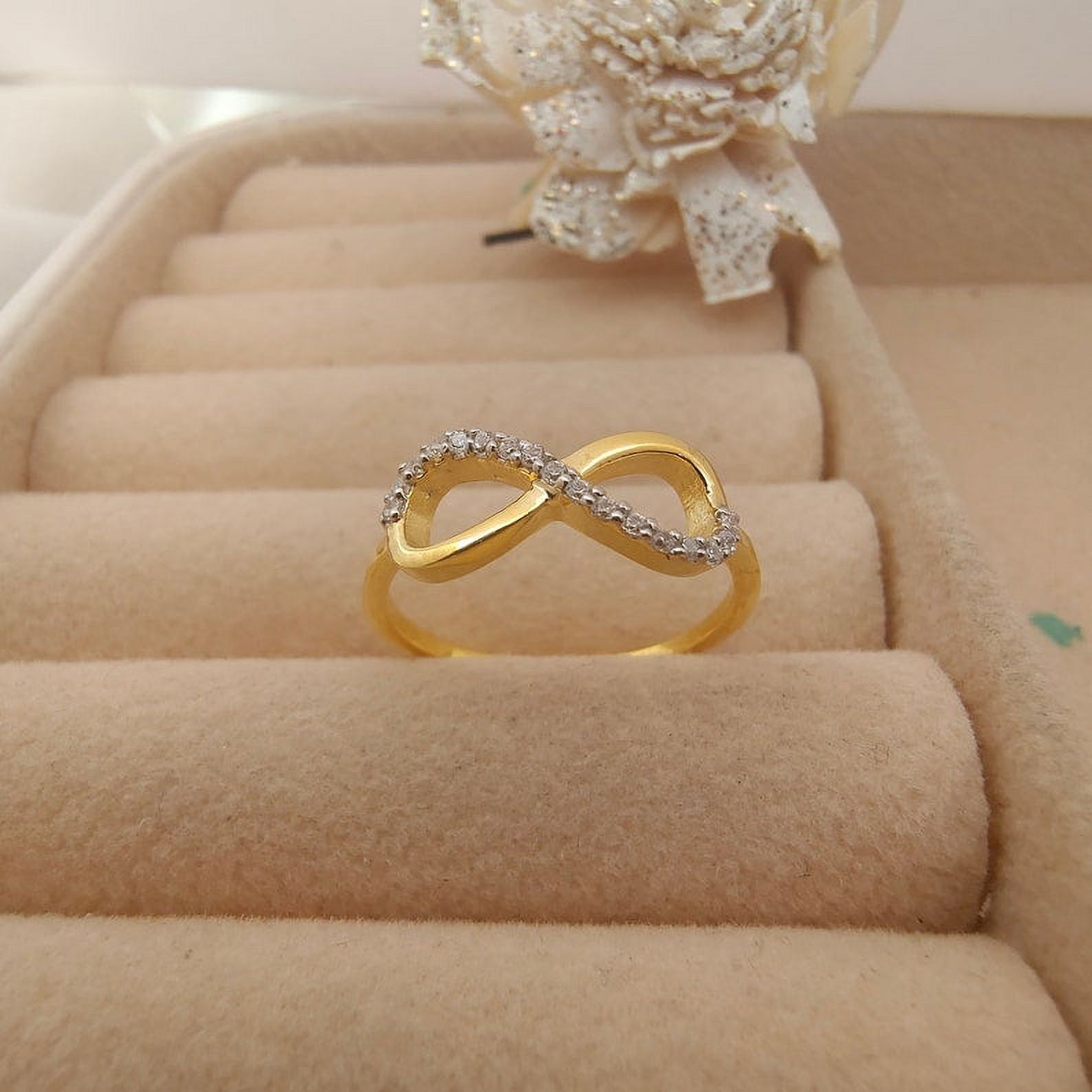 Infinity symbol engagement ring deals