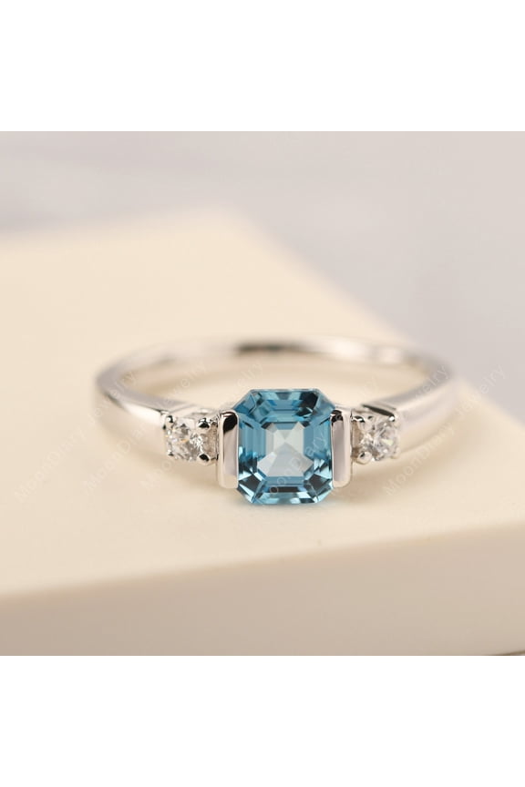 Asscher cut Swiss blue topaz wedding ring silver light blue November birthstone ring