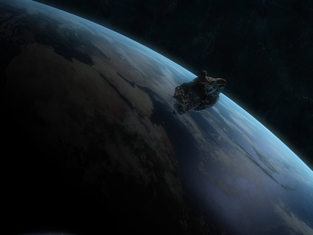 Asteroid in front of the Earth Canvas Art - Carbon LotusStocktrek Images (32 x 24)