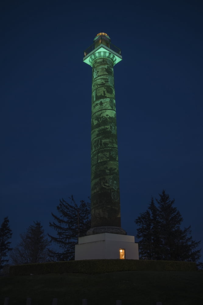The Astoria Column is turned green to mark Domestic Violence Awareness Month Astoria Oregon United States of America Canvas Art - Robert L Potts  Design Pics (12 x 19)